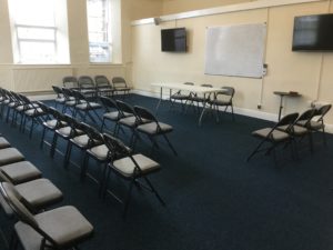 Photo of room 1 with chairs laid out for a meeting